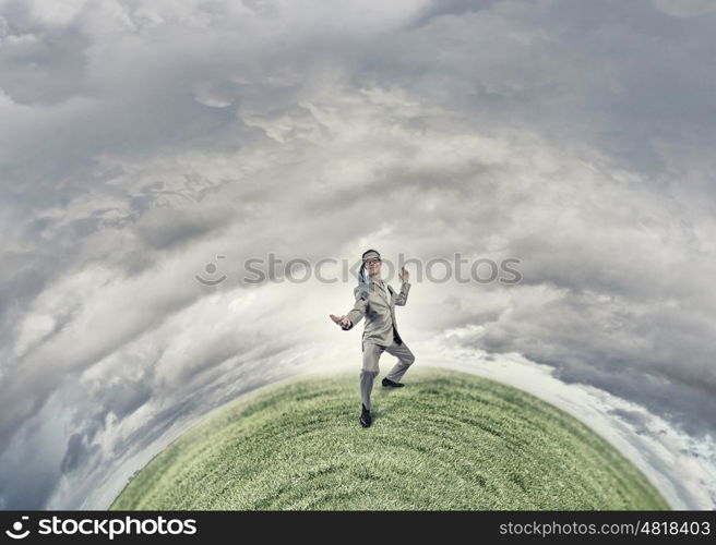 With tie on head. Cheerful young businessman with tie around head