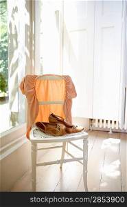 Woman&acute;s Clothing on Chair
