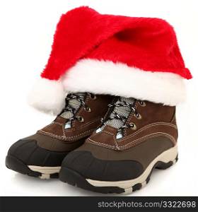 Woman&acute;s tie up (lace up) weather proof snow boots with santa hat.