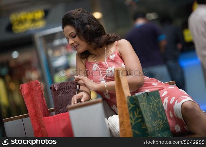 Woman admiring her shopping
