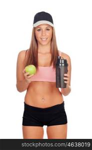 Woman after her training, drinking protein shake and with an apple in hand