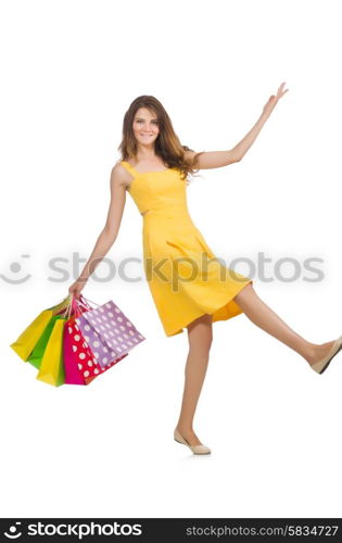 Woman after shopping spree on white