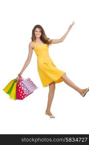 Woman after shopping spree on white