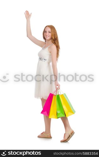 Woman after shopping spree on white