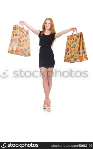 Woman after shopping spree on white