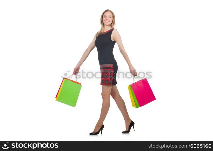 Woman after shopping spree on white