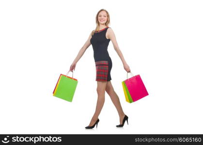 Woman after shopping spree on white