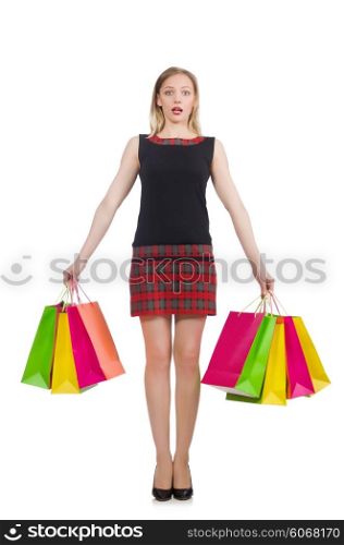 Woman after shopping spree on white