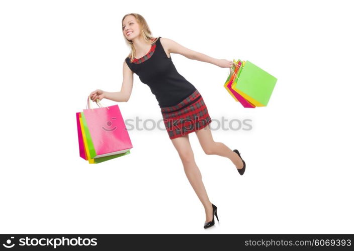 Woman after shopping spree on white