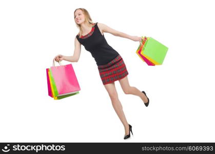 Woman after shopping spree on white