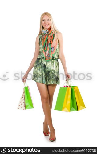 Woman after shopping spree on white