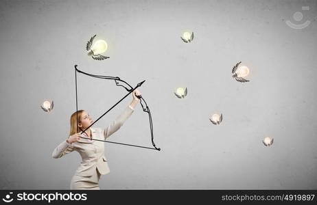 Woman aiming her goal. Young woman archer in suit aiming to idea bulb