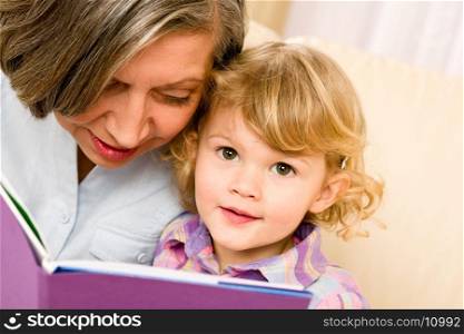 Woman and child reading