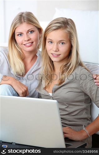Woman and child surfing on internet