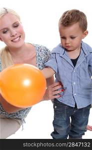 Woman and child with a balloon