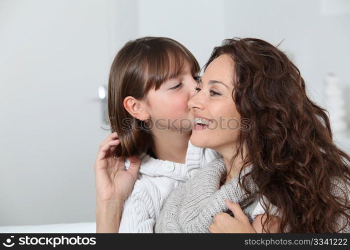 Woman and daughter at home