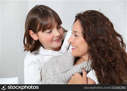 Woman and daughter at home