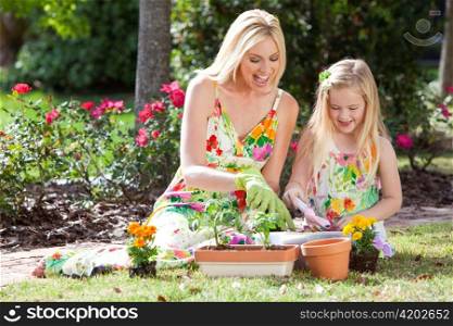 Woman and Girl, Mother & Daughter, Gardening Planting Flowers