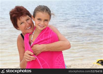 Woman and kid by the seaside