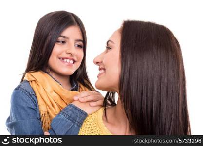 Woman and little girl hugging each other - Family concep