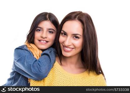 Woman and little girl hugging each other - Family concep