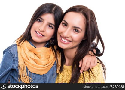 Woman and little girl hugging each other - Family concept