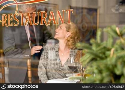 Woman and man in a restaurant