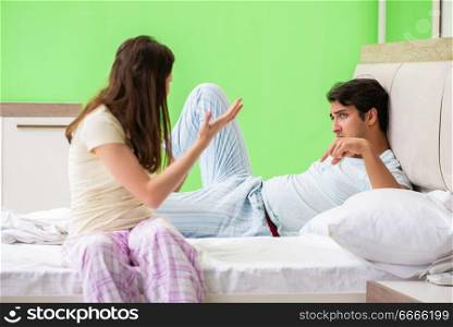 Woman and man in the bedroom during conflict