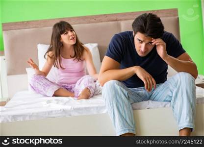 Woman and man in the bedroom during conflict. The woman and man in the bedroom during conflict