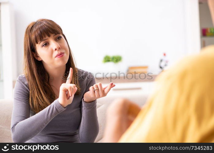 Woman and man learning sign language