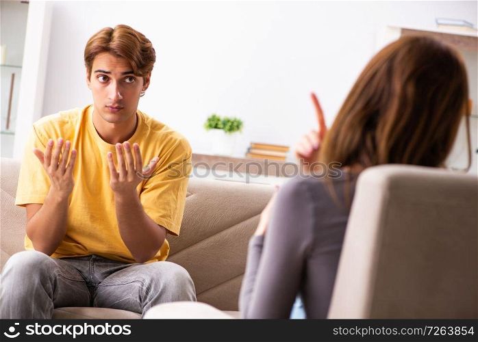 Woman and man learning sign language. The woman and man learning sign language