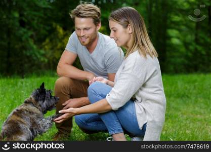 woman and man with dog