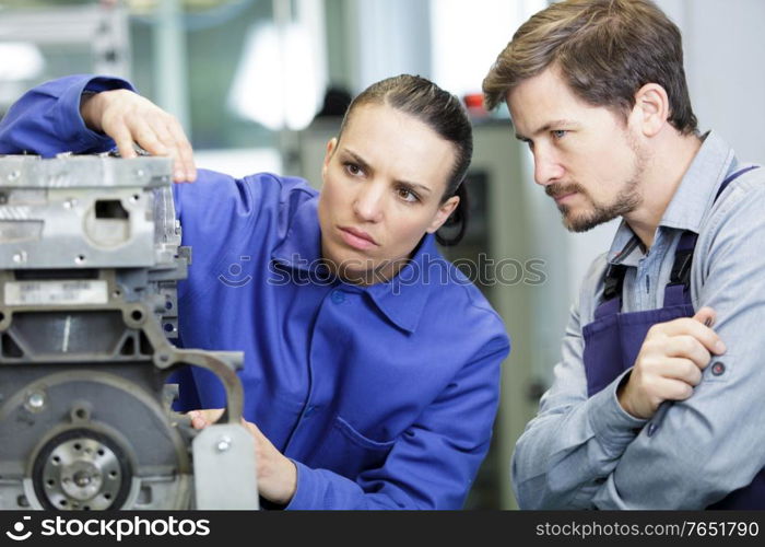 woman and man working in factory