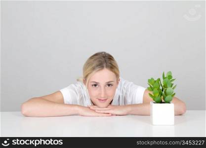 Woman and natural plants set on table