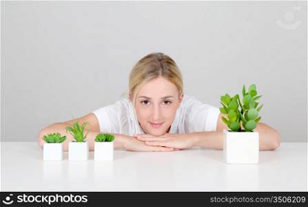 Woman and natural plants set on table