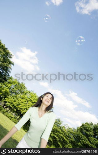 Woman and soap bubbles