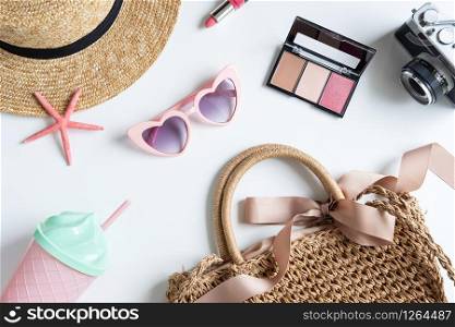 Woman and travel accessories with make up, cosmetics, brush and camera, Top view