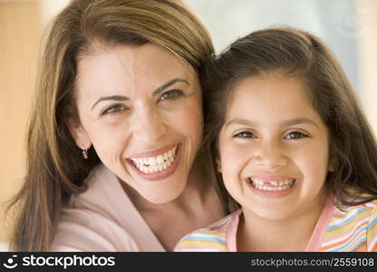 Woman and young girl smiling