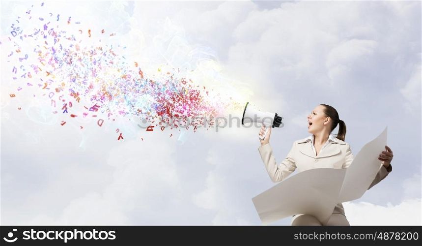 Woman announcing news. Portrait of young businesswoman with newspaper screaming in megaphone