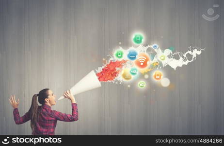 Woman announcing something. Young pretty woman screaming in paper trumpet