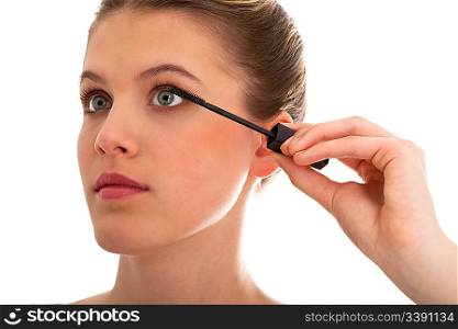 woman applying mascara on white background