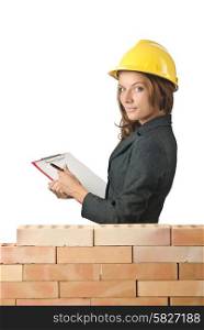 Woman architect near brick wall