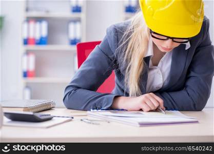 Woman architect working on the project . Woman architect working on the project