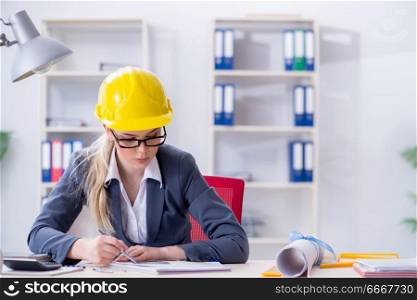 Woman architect working on the project . Woman architect working on the project