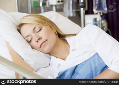 Woman Asleep In Hospital Bed