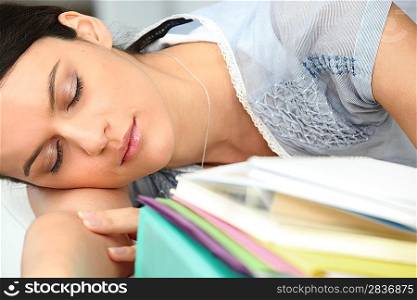 Woman asleep on her workplace