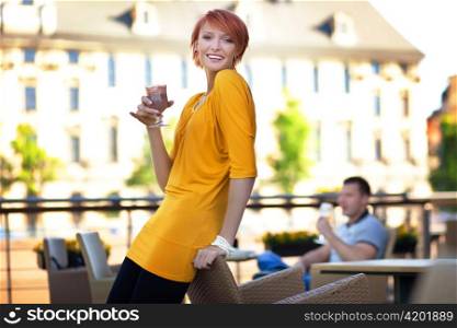 Woman at a cafe.