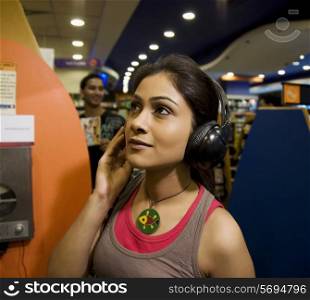 Woman at a music store