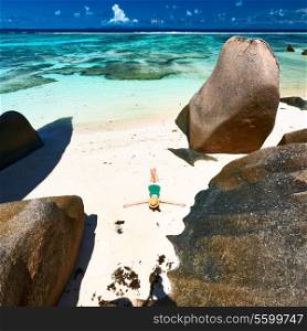 Woman at beautiful beach at Seychelles