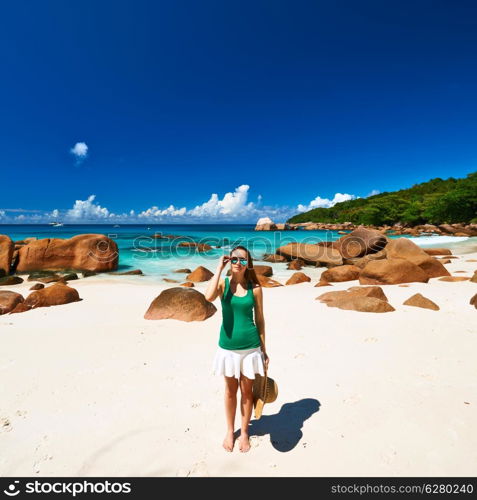 Woman at beautiful beach at Seychelles